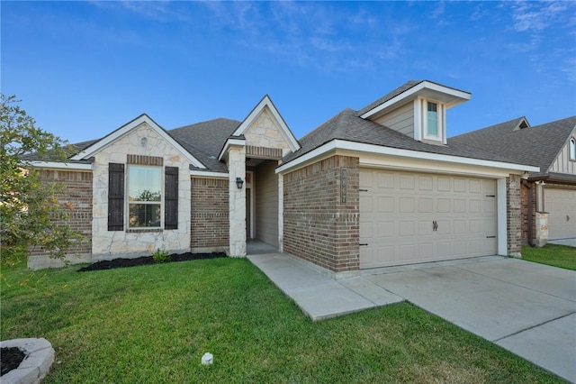 ranch-style home with a front yard and a garage