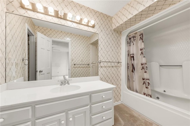 bathroom with shower / tub combo and vanity