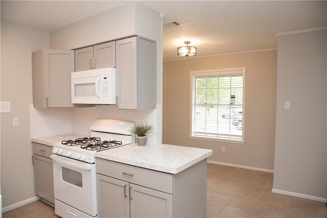 3023 Kim St, Bryan, TX 77803 - kitchen featuring white appliances, gray cabinets, baseboards, and ornamental molding