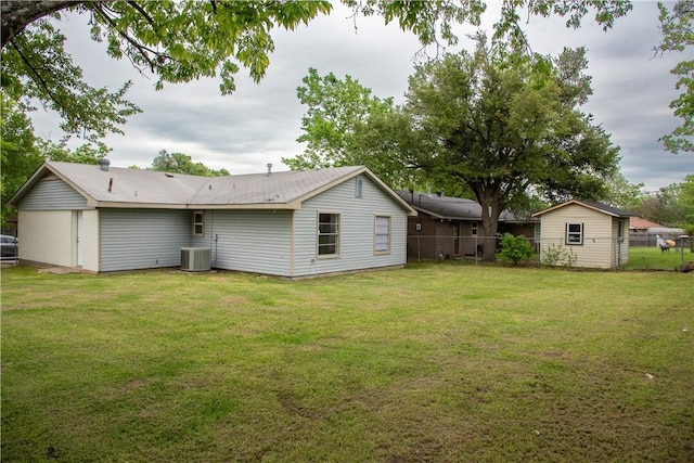 3023 Kim St, Bryan, TX 77803 - rear view of house featuring central air condition unit