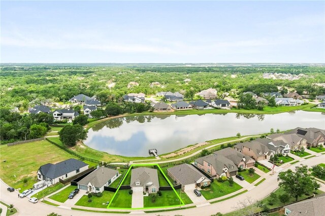 1932 Sherrill Ct, College Station, TX 77845 - aerial perspective of suburban area featuring a nearby body of water and property parcel outlined