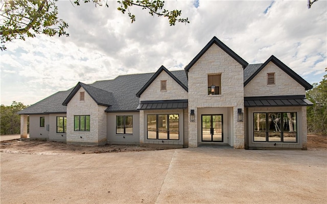 back of property featuring a patio area