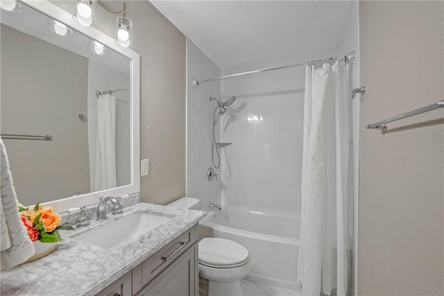 full bathroom with shower / tub combo, vanity, and toilet