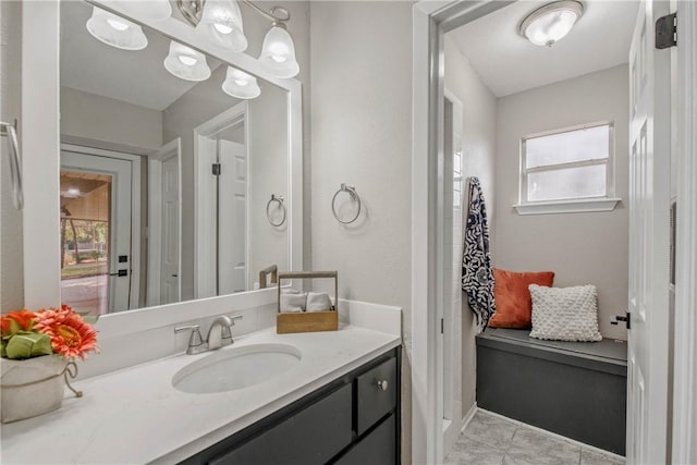 bathroom featuring vanity and plenty of natural light