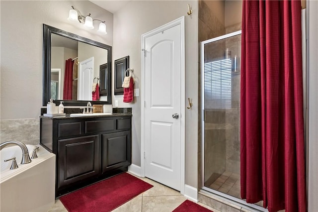 bathroom featuring tile patterned floors, separate shower and tub, and vanity