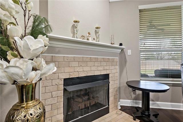 interior details with a fireplace and hardwood / wood-style floors