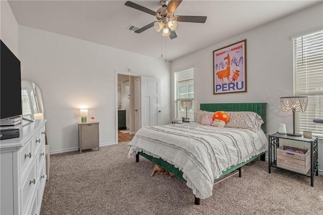 808 Mineral Wells Ln, College Station, TX 77845 - bedroom featuring light carpet, multiple windows, and ceiling fan