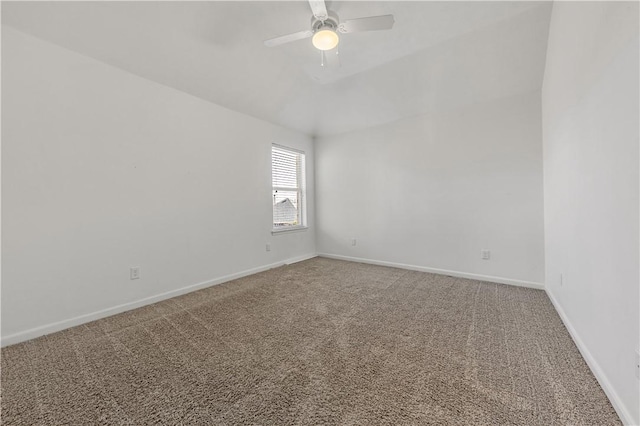 empty room featuring carpet flooring and ceiling fan