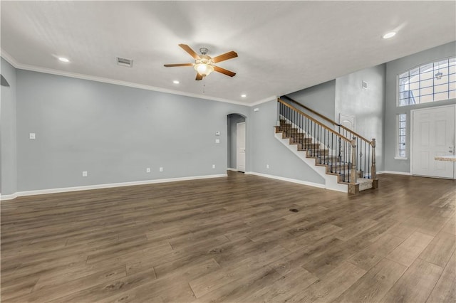 unfurnished living room featuring crown molding, hardwood / wood-style flooring, and ceiling fan