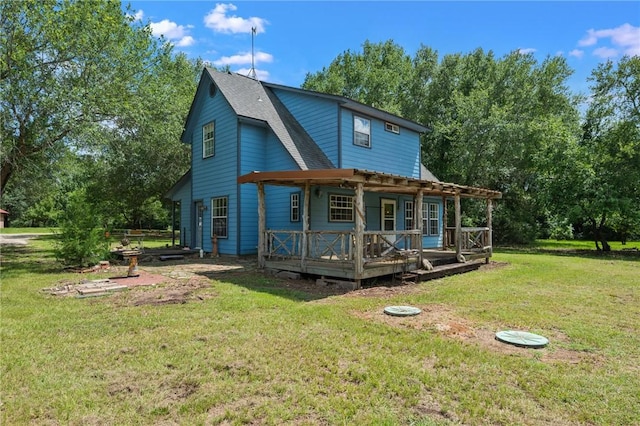 5270 Slippery Rock, Bryan, TX 77808 - rear view of property with a lawn, a wooden deck, roof with shingles, and view of wooded area