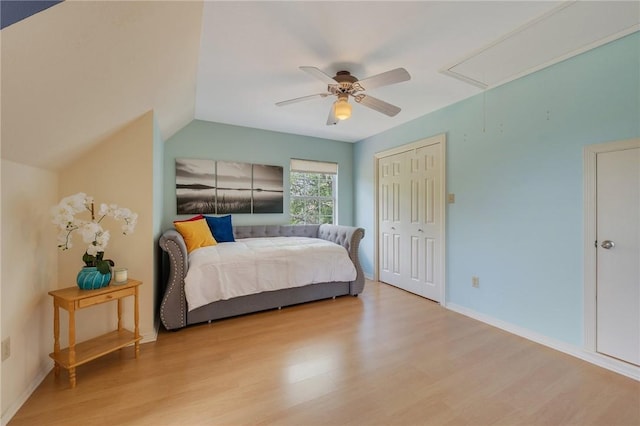 5270 Slippery Rock, Bryan, TX 77808 - bedroom with attic access, wood finished floors, a ceiling fan, and a closet