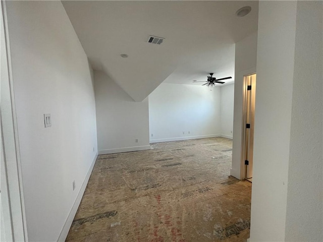 bonus room featuring visible vents, ceiling fan, and baseboards