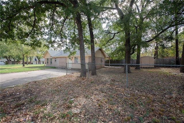 exterior space with a storage shed