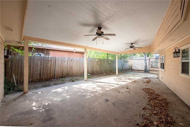 view of patio featuring ceiling fan