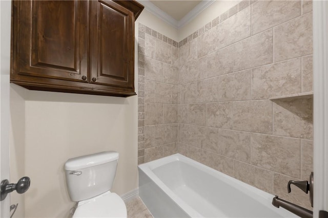 bathroom with crown molding, toilet, and bathing tub / shower combination