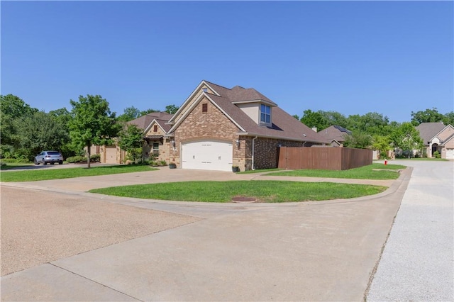 view of front facade with concrete driveway, brick siding, and a garage
