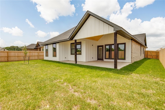 2802 Spector Dr, Bryan, TX 77808 - rear view of property featuring a patio, a shingled roof, and board and batten siding