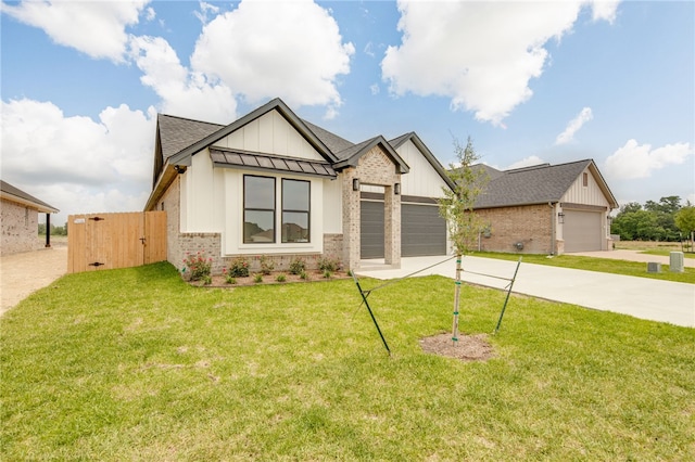 2802 Spector Dr, Bryan, TX 77808 - modern farmhouse with board and batten siding, driveway, a garage, brick siding, and a front yard