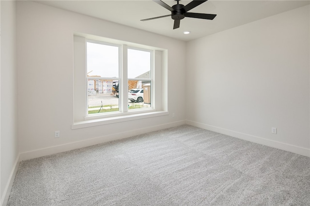 2802 Spector Dr, Bryan, TX 77808 - carpeted spare room with baseboards and ceiling fan