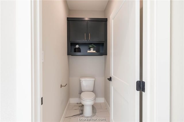 bathroom featuring toilet