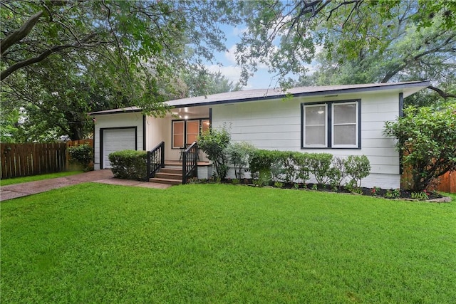 907 Barnhill St, Brenham, TX 77833 - ranch-style house with concrete driveway and an attached garage