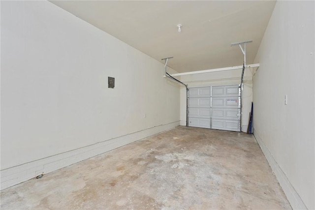 907 Barnhill St, Brenham, TX 77833 - garage featuring baseboards