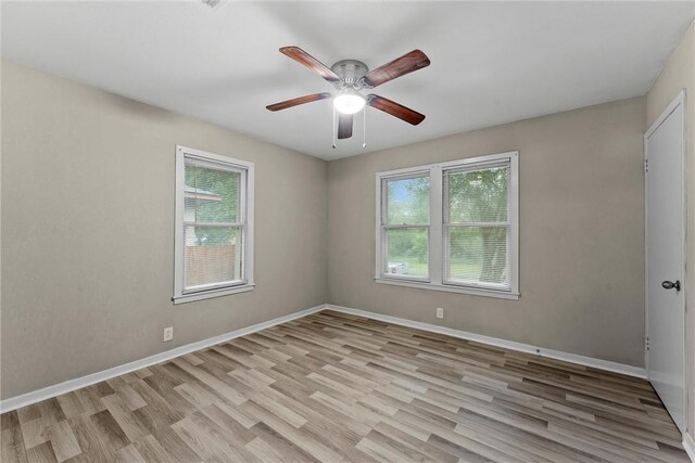 907 Barnhill St, Brenham, TX 77833 - unfurnished room featuring a ceiling fan and light wood-type flooring