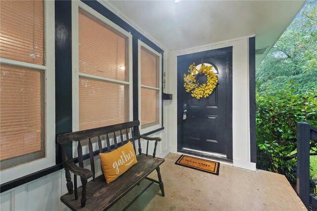 907 Barnhill St, Brenham, TX 77833 - property entrance with a porch