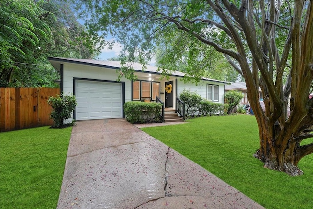 907 Barnhill St, Brenham, TX 77833 - single story home with an attached garage and concrete driveway