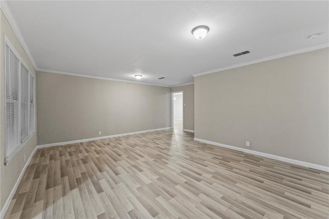 907 Barnhill St, Brenham, TX 77833 - unfurnished room with light wood-type flooring and ornamental molding