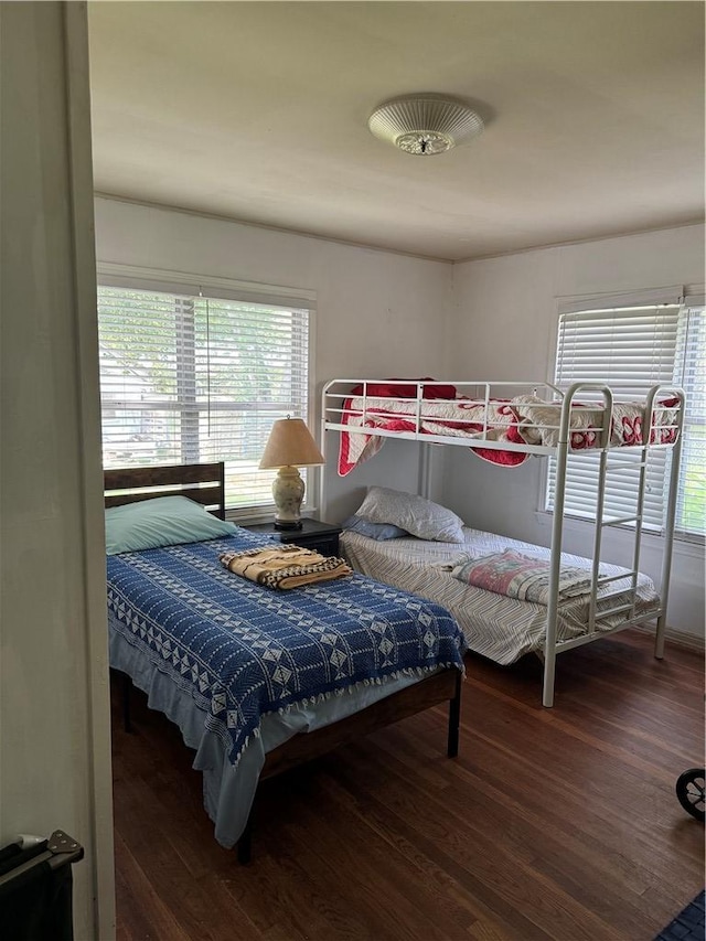 610 Calvert St, Hearne, TX 77859 - bedroom featuring wood finished floors
