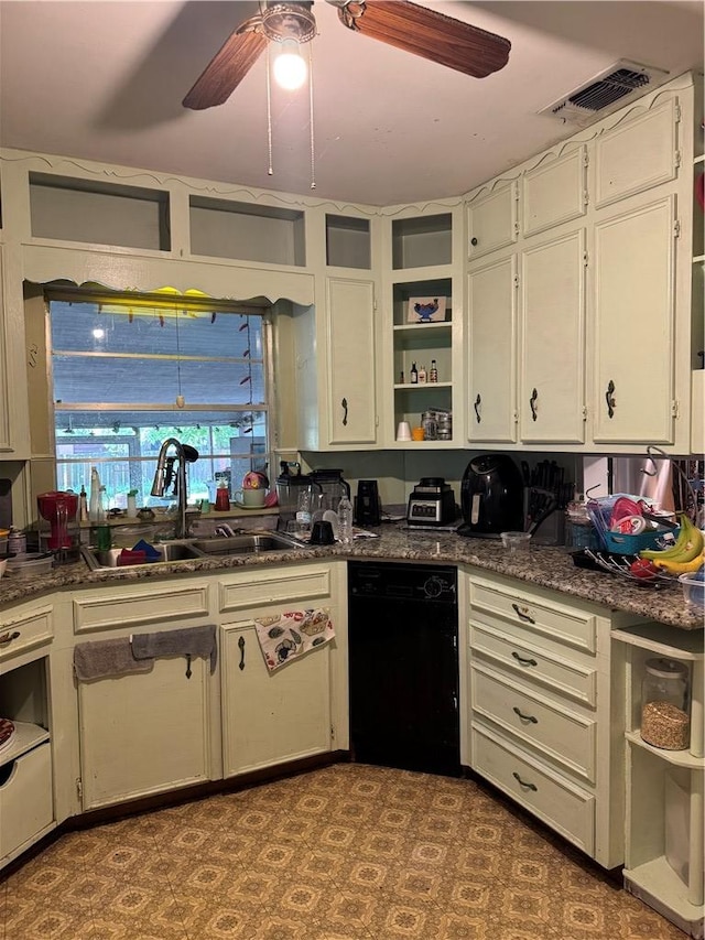610 Calvert St, Hearne, TX 77859 - kitchen featuring open shelves, a sink, ceiling fan, dishwasher, and white cabinets