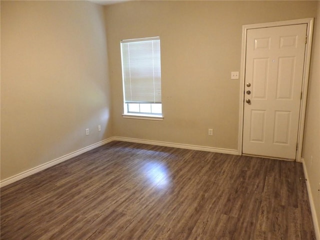 1702 Deacon Dr Unit 101, College Station, TX 77845 - unfurnished room featuring dark wood-type flooring and baseboards