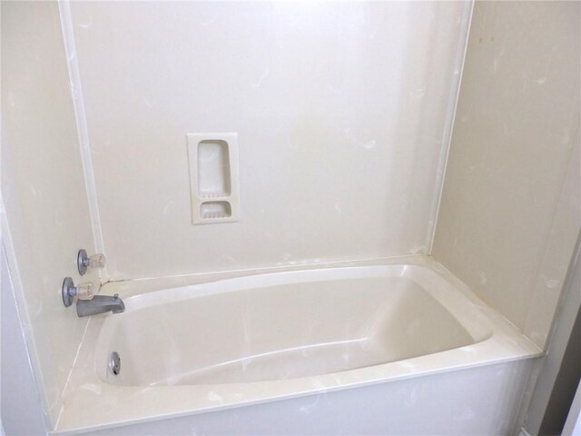 1702 Deacon Dr Unit 101, College Station, TX 77845 - bathroom featuring a tub