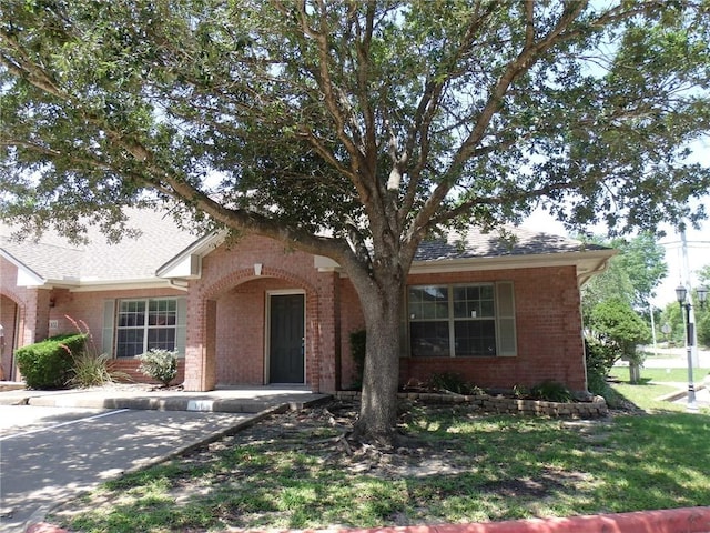 1702 Deacon Dr Unit 101, College Station, TX 77845 - obstructed view of property with brick siding