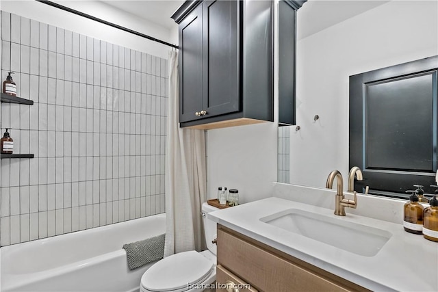 full bathroom with shower / tub combo, vanity, and toilet