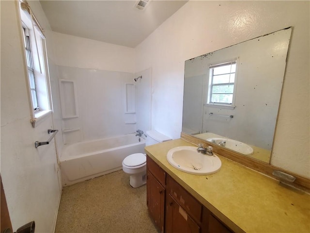 full bathroom featuring vanity, tub / shower combination, and toilet