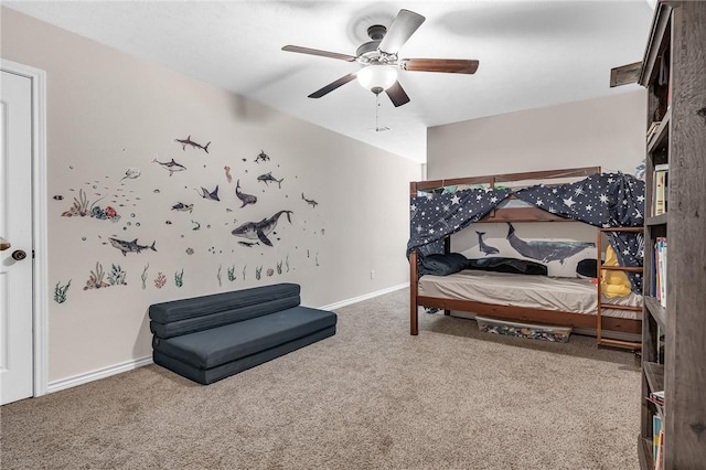 bedroom featuring carpet flooring, a ceiling fan, and baseboards