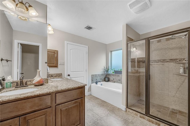 full bathroom with a bath, visible vents, a shower stall, and double vanity