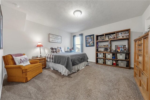 carpeted bedroom with a textured ceiling