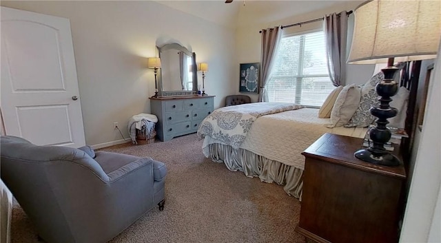 bedroom featuring light carpet