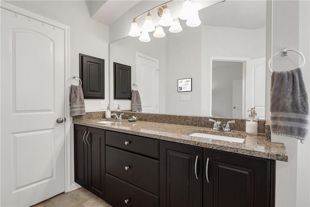 bathroom with vanity and tile patterned floors