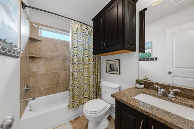 full bathroom with vanity, toilet, and shower / tub combo