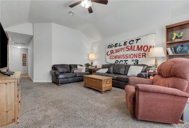 carpeted living room featuring vaulted ceiling and ceiling fan