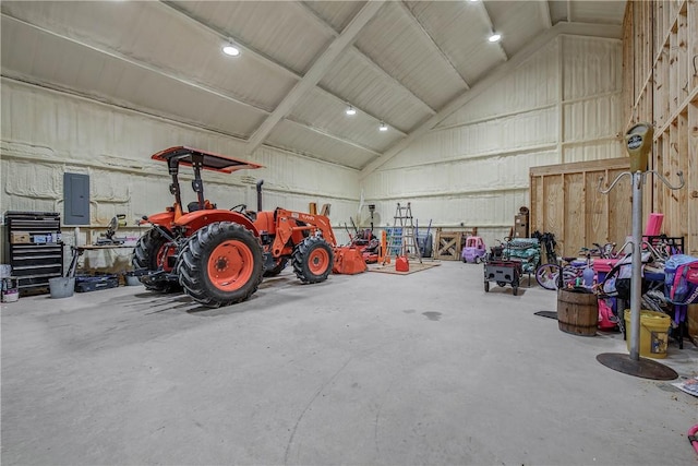 garage with metal wall and electric panel