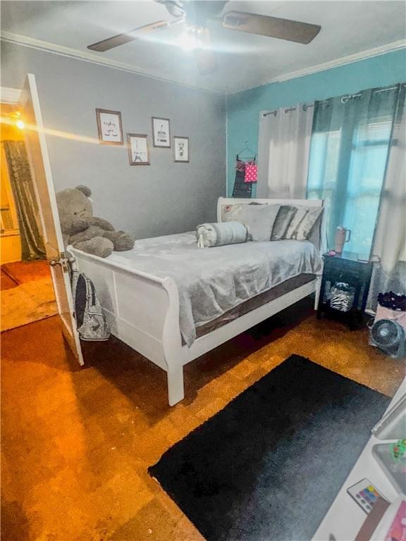 901 Post Oak St, Hearne, TX 77859 - bedroom with crown molding and ceiling fan