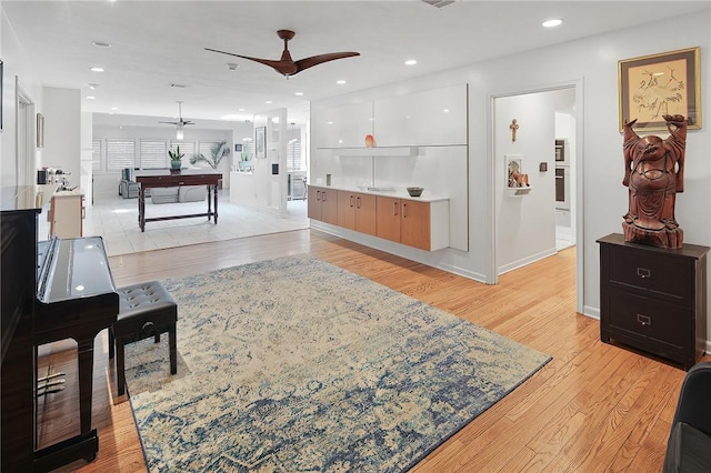 1013 Winding Rd, College Station, TX 77840 - living room with recessed lighting, visible vents, baseboards, a ceiling fan, and light wood finished floors