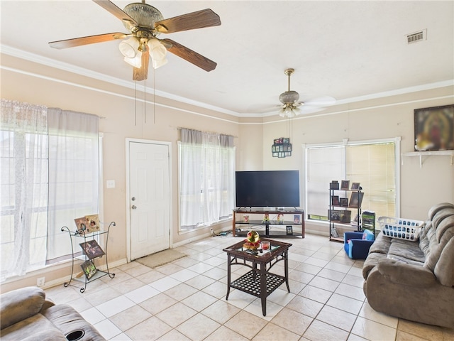 1008 Bittle Ln, Bryan, TX 77803 - living area featuring ceiling fan, light tile patterned flooring, plenty of natural light, and crown molding