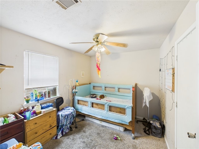 1008 Bittle Ln, Bryan, TX 77803 - bedroom with carpet and a ceiling fan