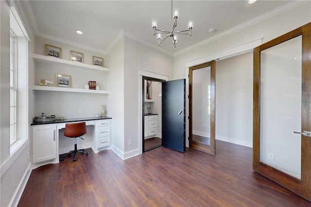7844 Mathis Creek Dr, Bryan, TX 77808 - home office with dark wood-style flooring, crown molding, built in desk, baseboards, and an inviting chandelier
